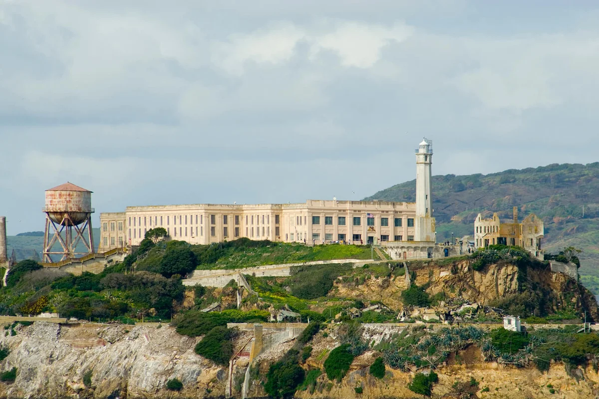 Lighthouse By Prison At Alcatraz Island Against Sky
