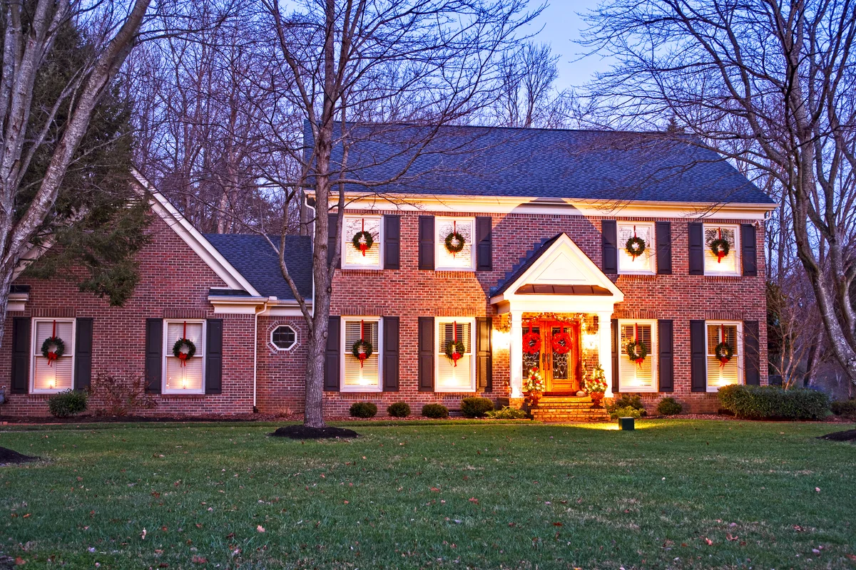 Home decorated for Christmas at night