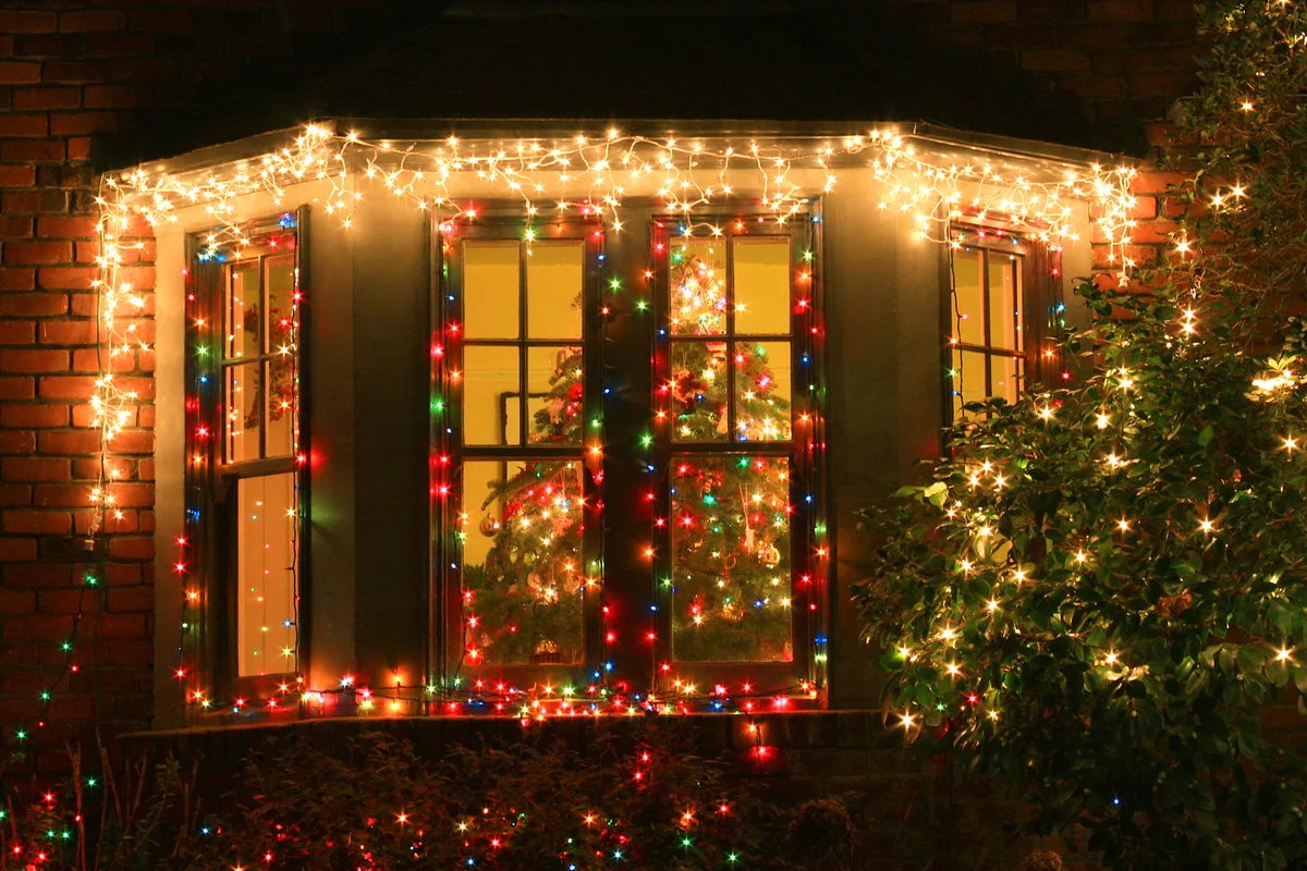 House window decorated with Christmas tree