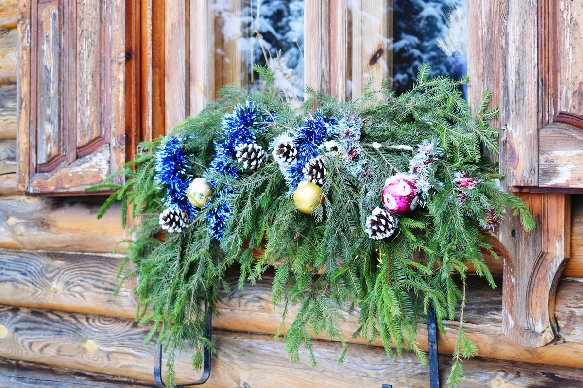 Christmas Decorations On Closed Wooden Window