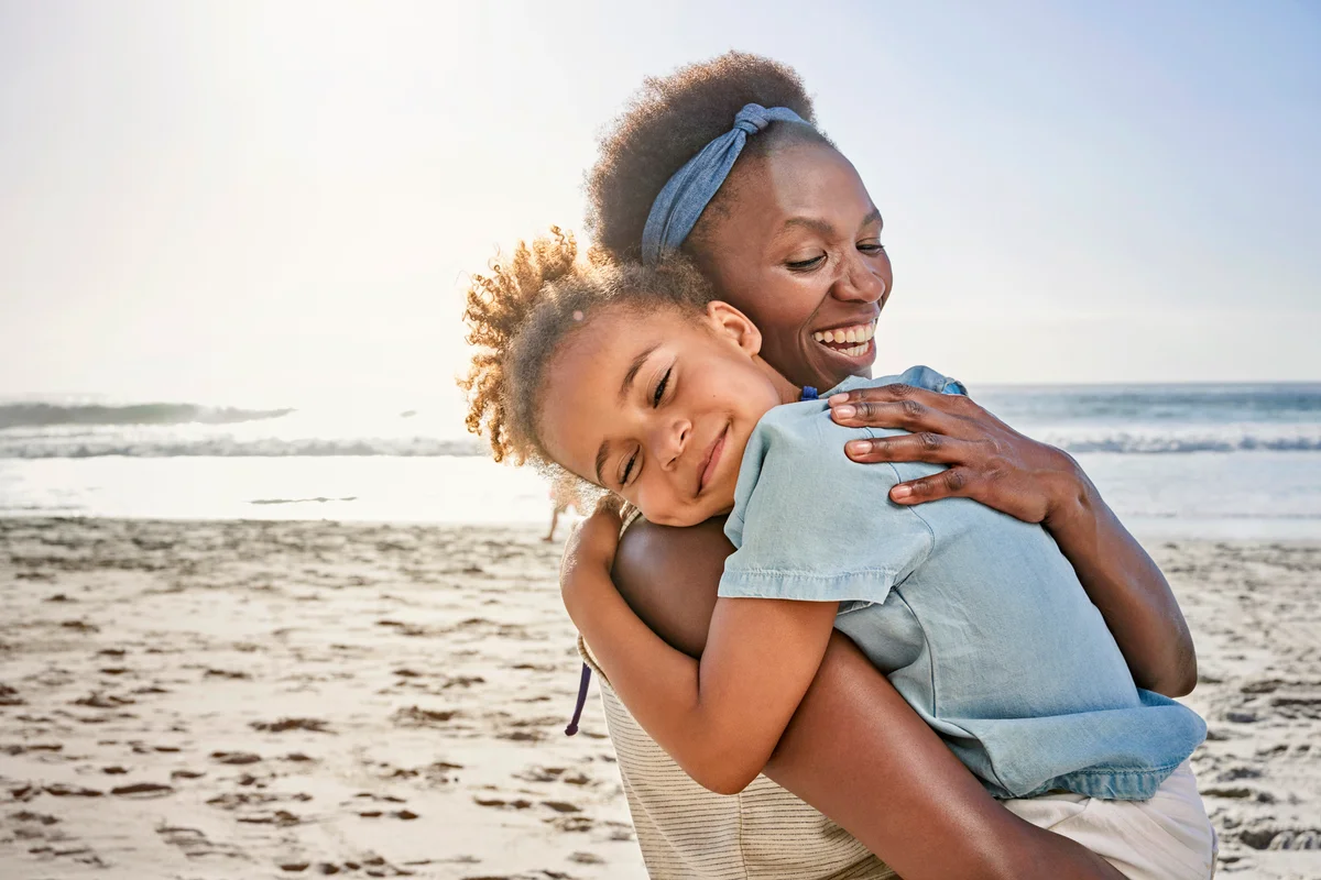 Mother and daughter on beach