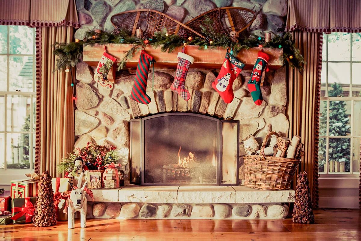 Stone fireplace decorated for Christmas