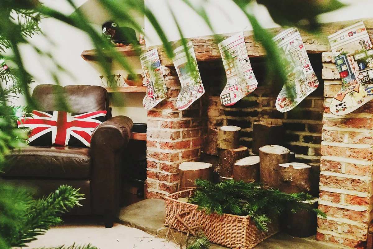 Christmas Stockings Hanging On Fireplace
