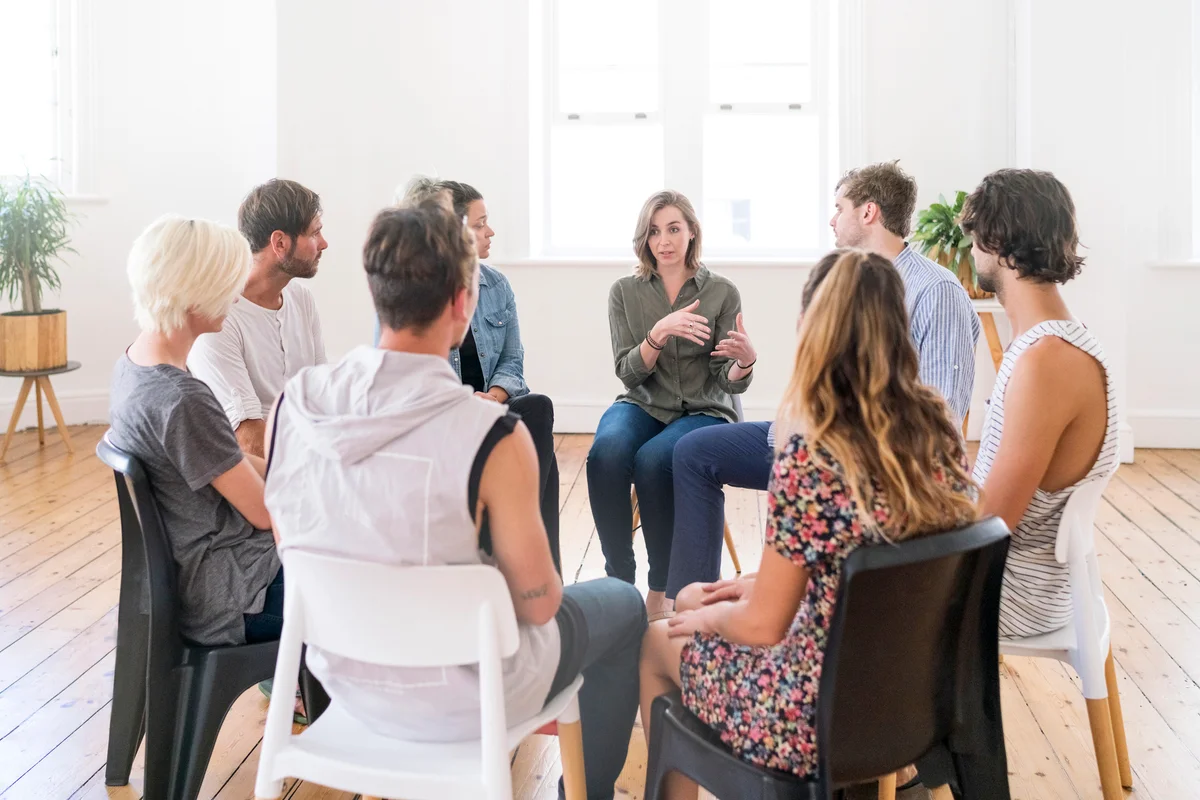 Support group gathering for a meeting