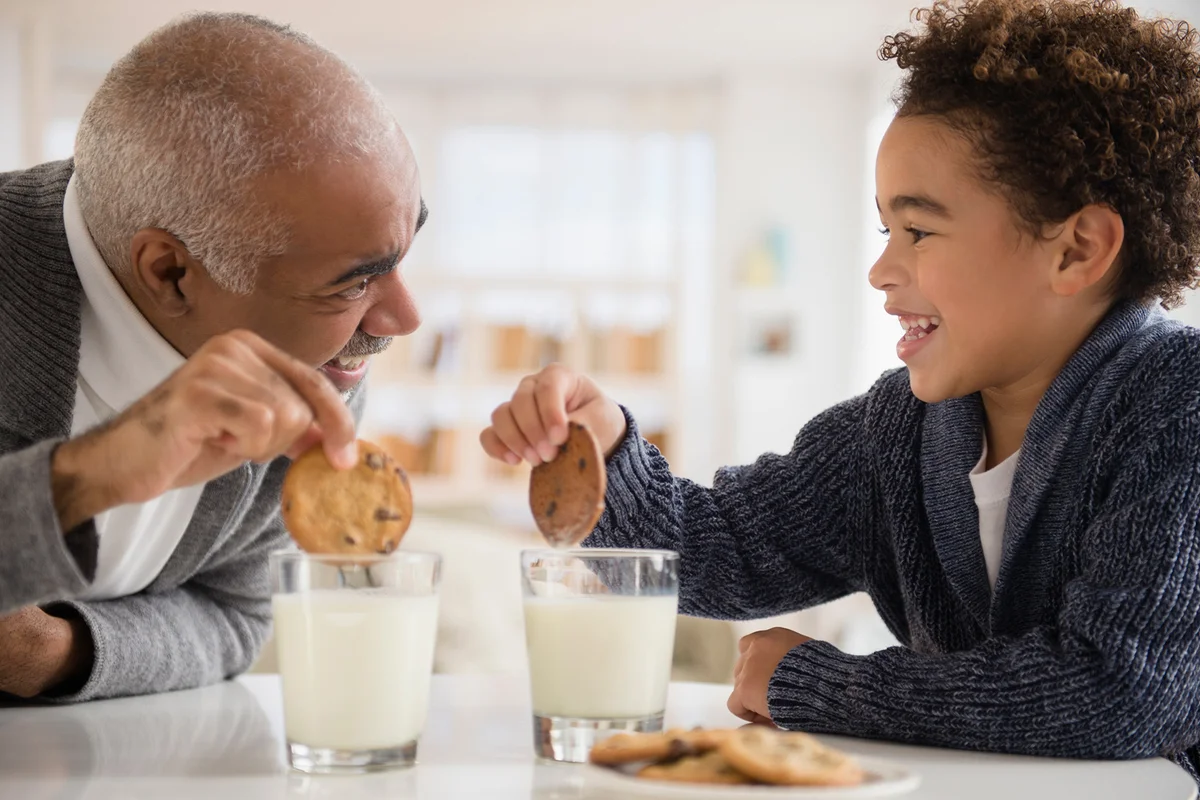 Grandfather-and-grandson-eating-cookies