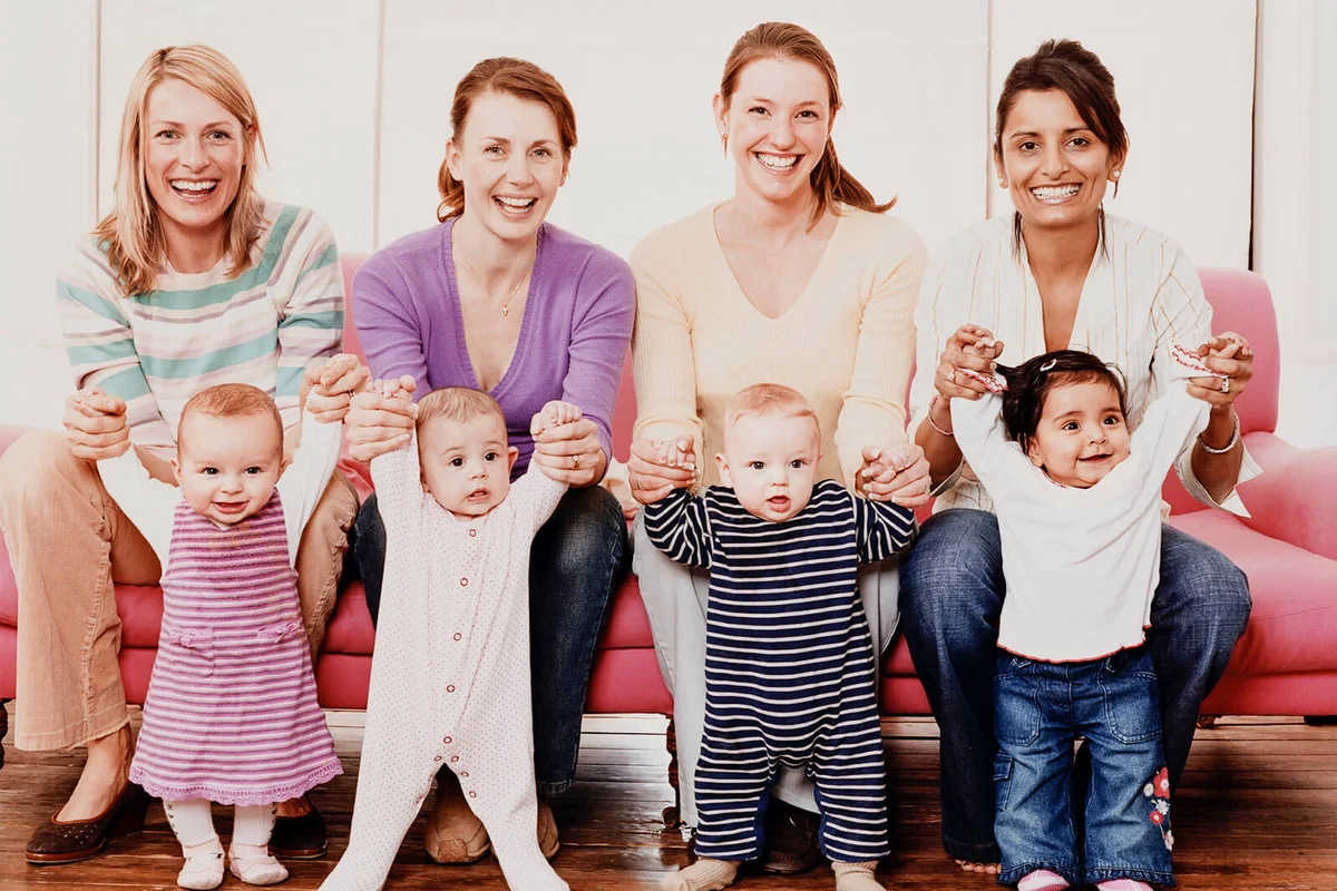Portrait of Four Young Mothers with Their Babies