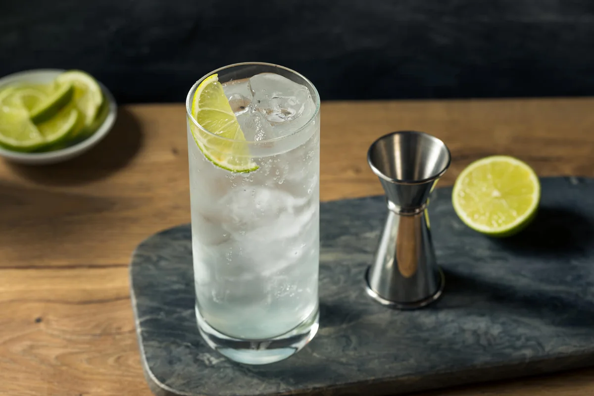 Refreshing Coconut Soda with a Lime Garnish