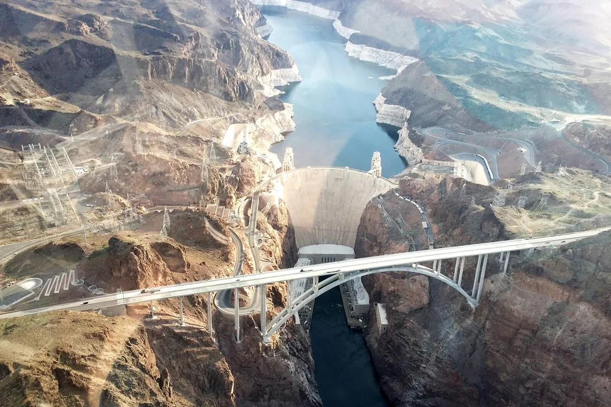 Aerial View Of Bridge And Hoover Dam Over Colorado River