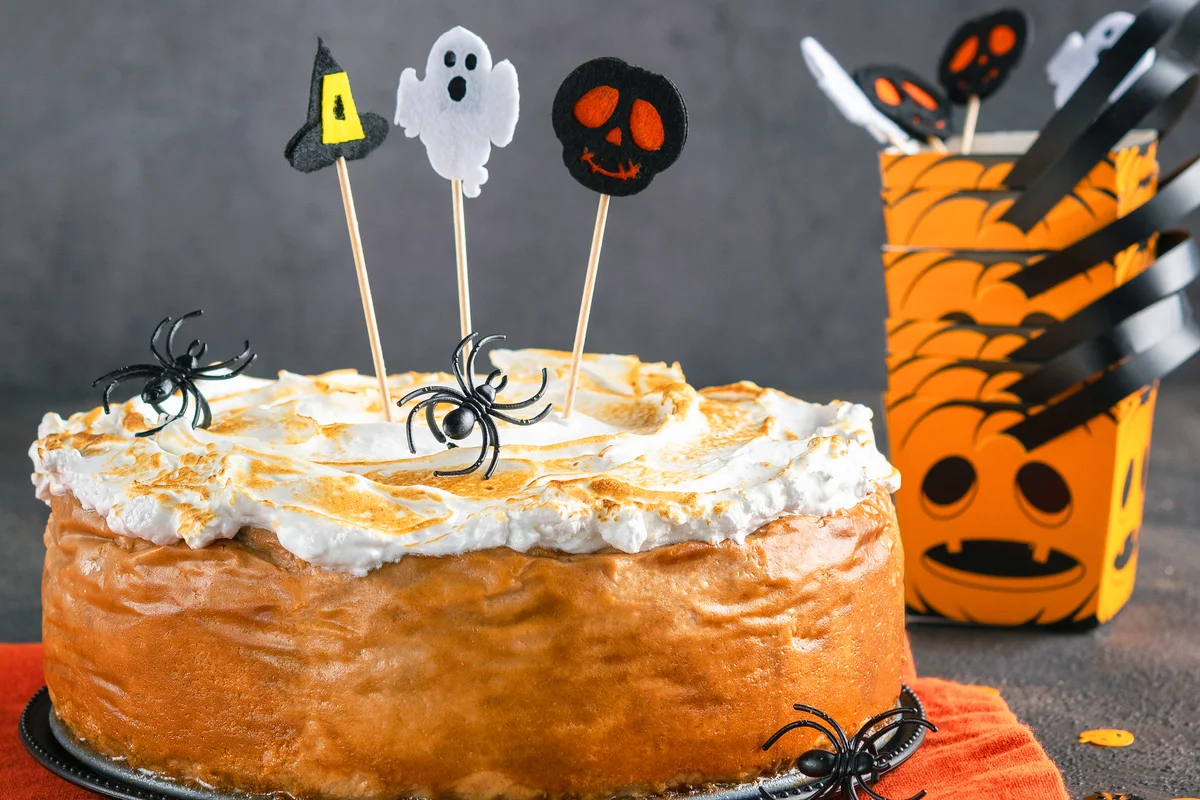 Cheesecake with Marshmallow Meringue Topping decorated with Halloween toppers