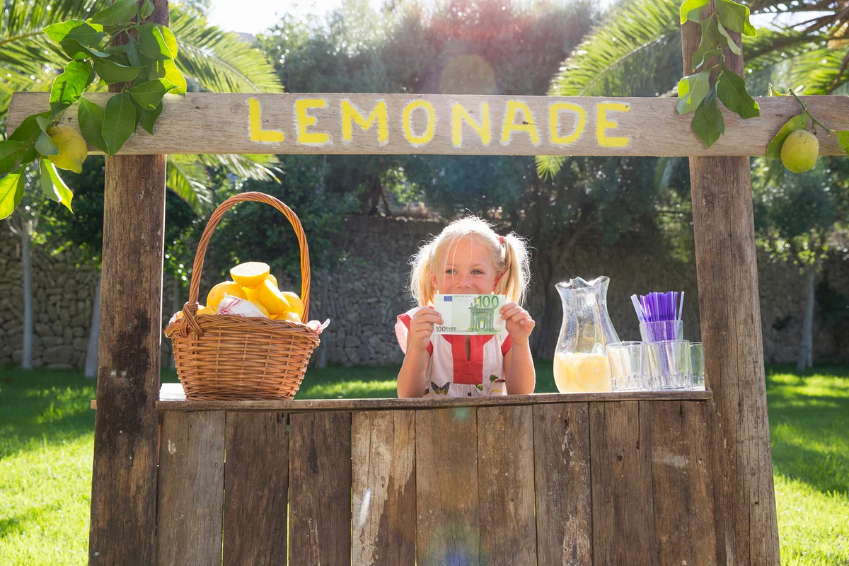 Girl on lemonade stand