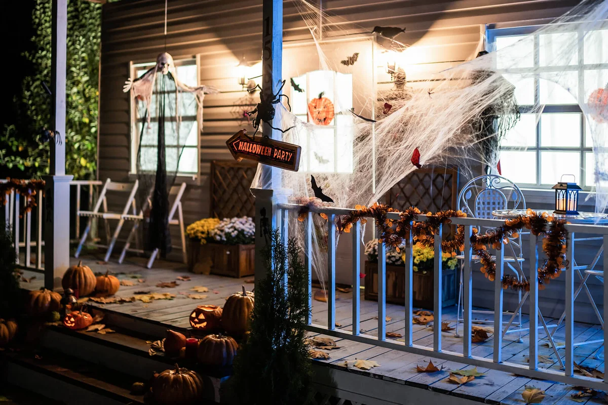 Halloween Jack-o-Lantern Pumpkins on a porch stairs