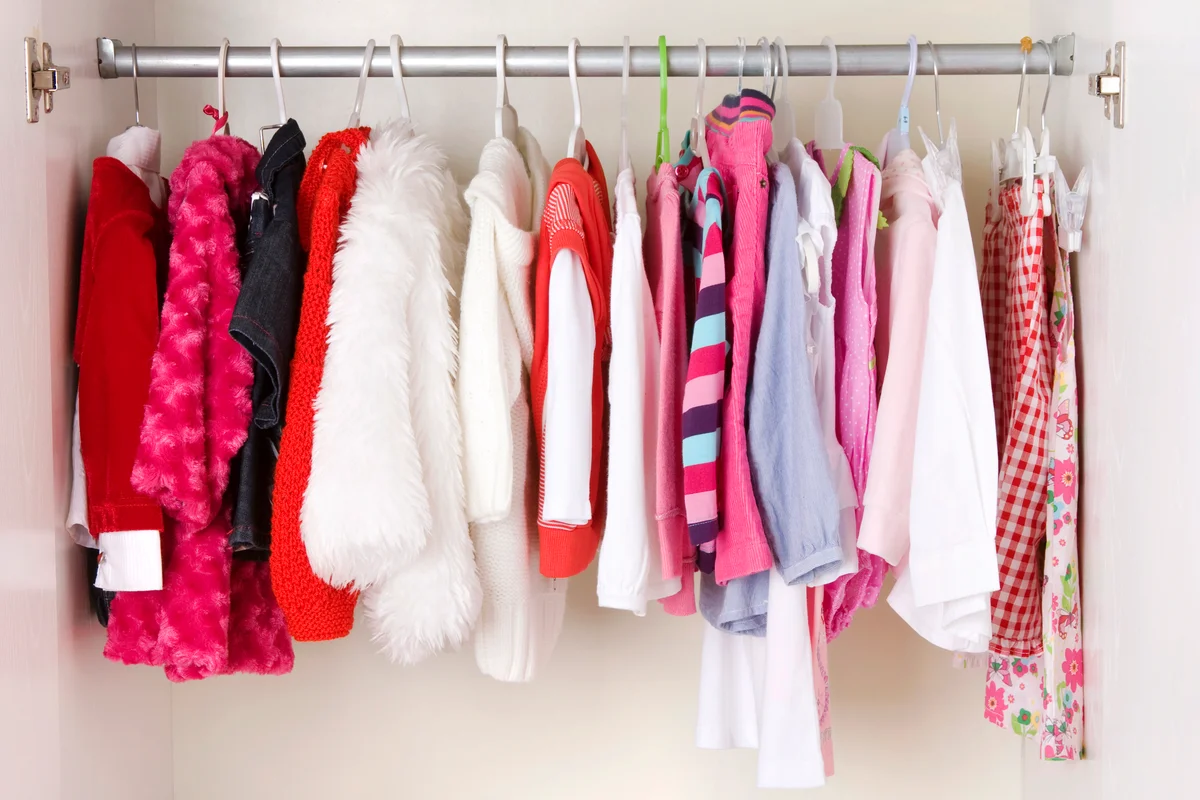 A closet with children clothes