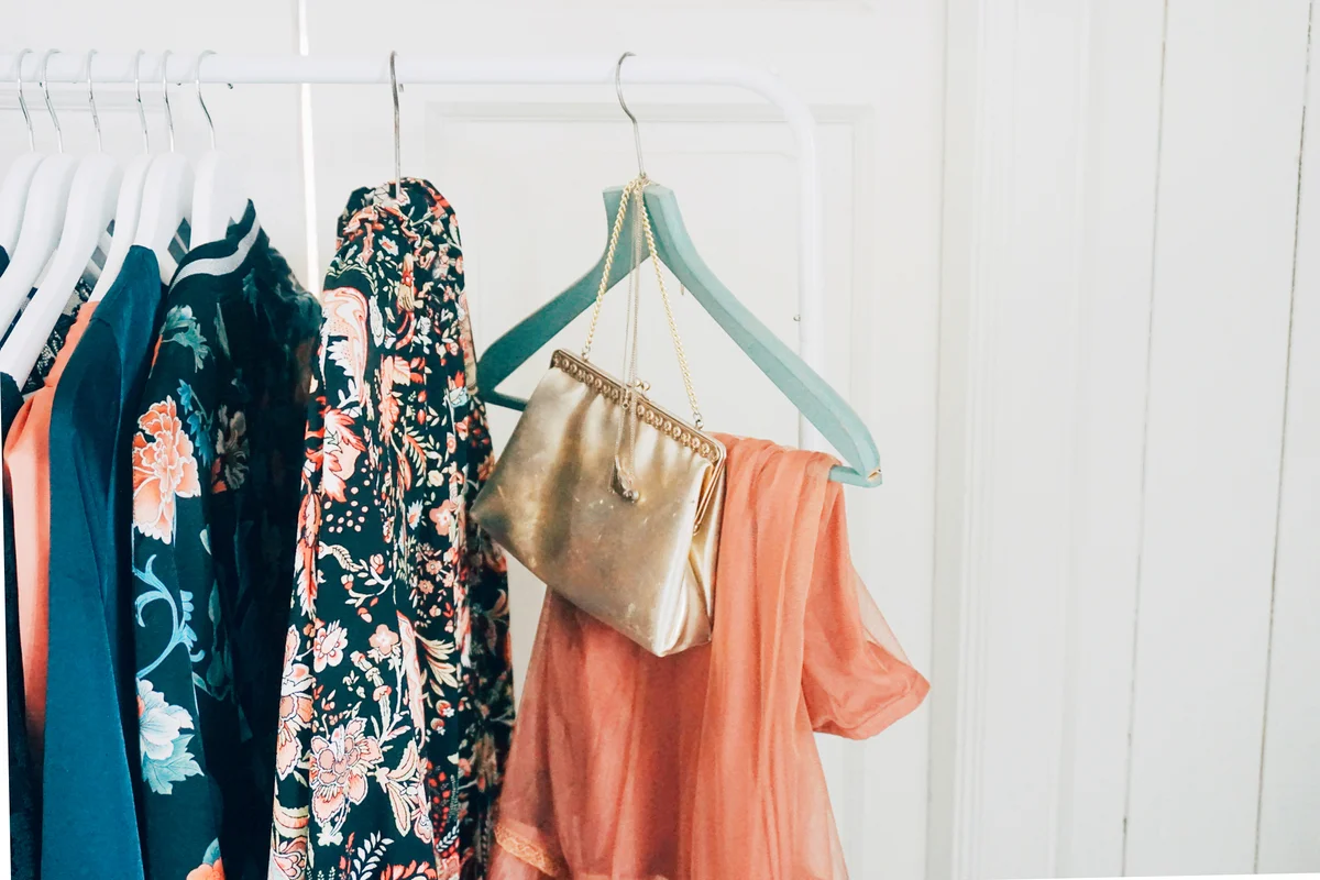 Clothes Hanging On Rack At Home