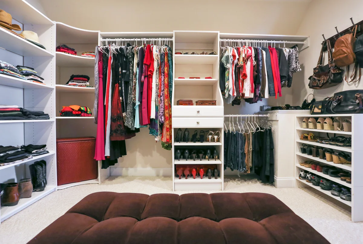 Woman's closet fully organized with space for everything
