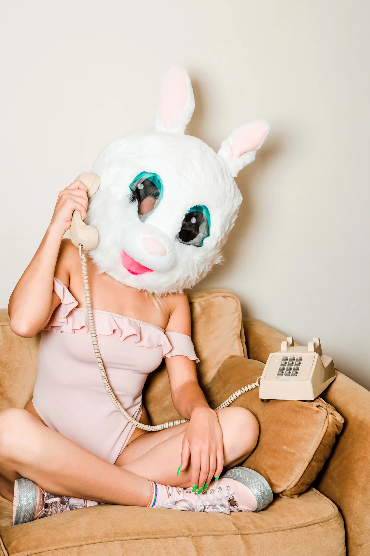 Woman Wearing Bunny Mask Bunny Costume Talking On Telephone