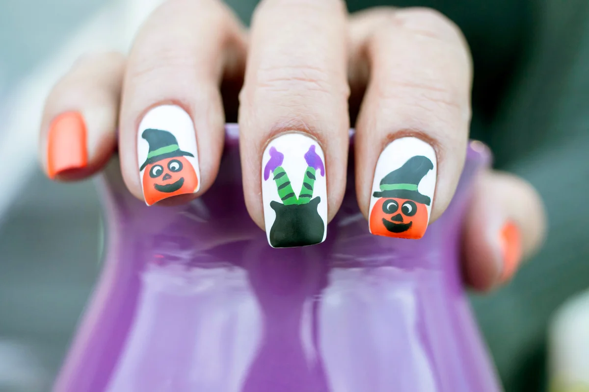 Pumpkin and Witch Legs Nail Art Design
