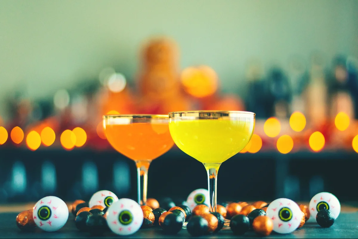 Halloween party still life with cocktails and eyes