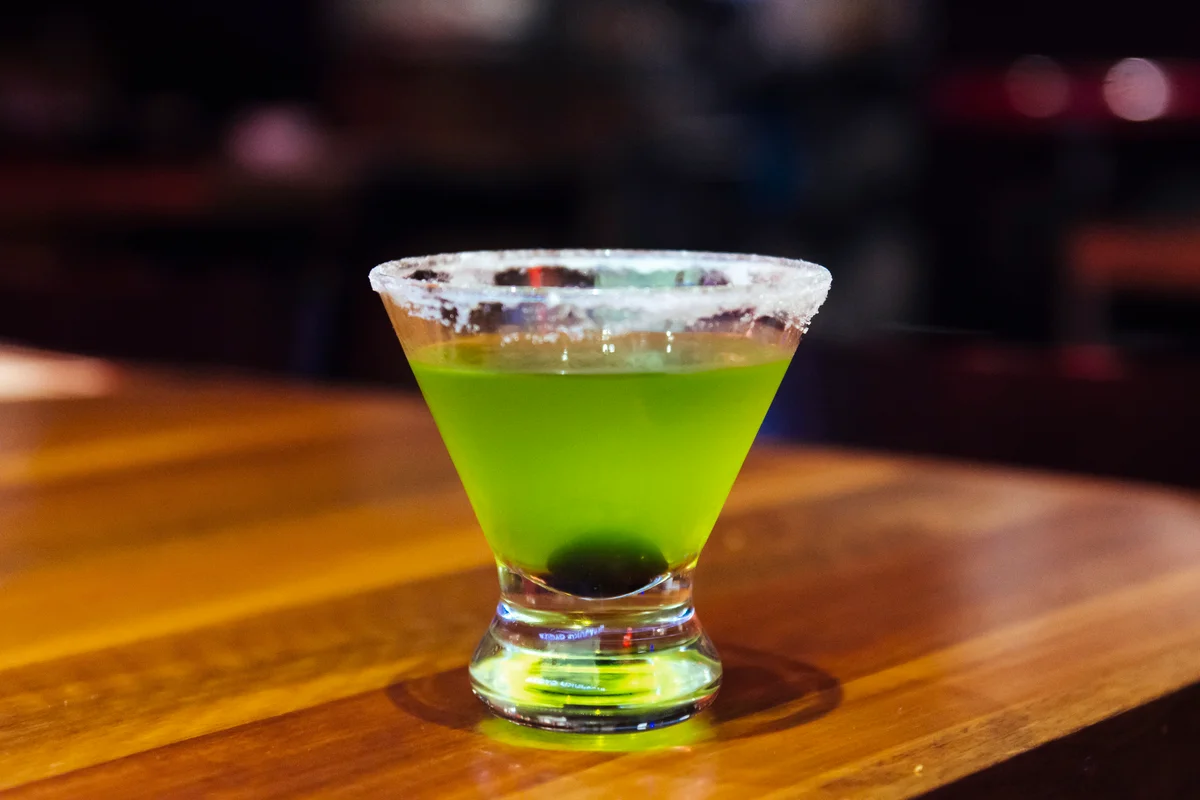 Green cocktail with sugar rim, served in a Stemless Martini Glass