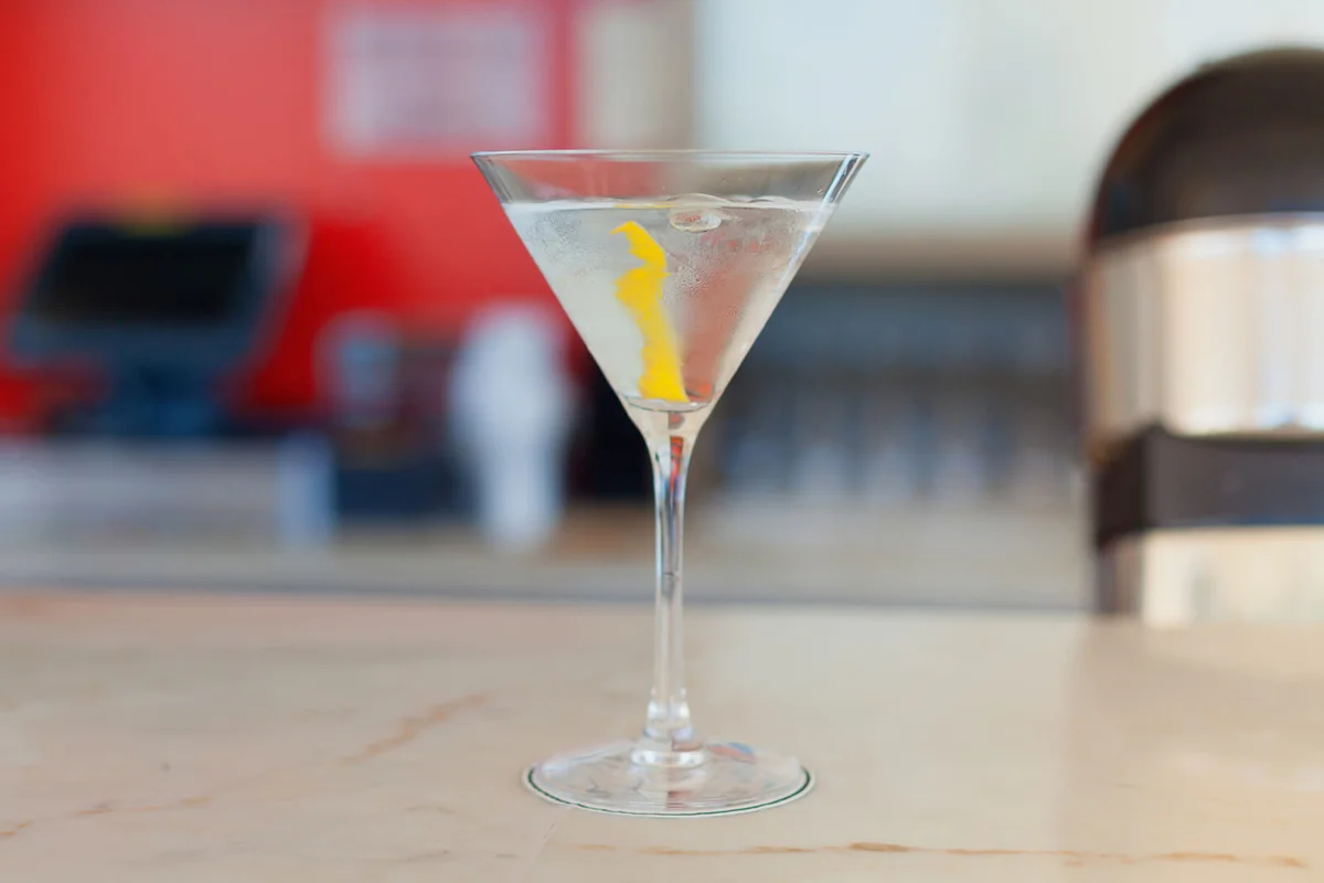 Close-Up Of Martini In Glass On Table