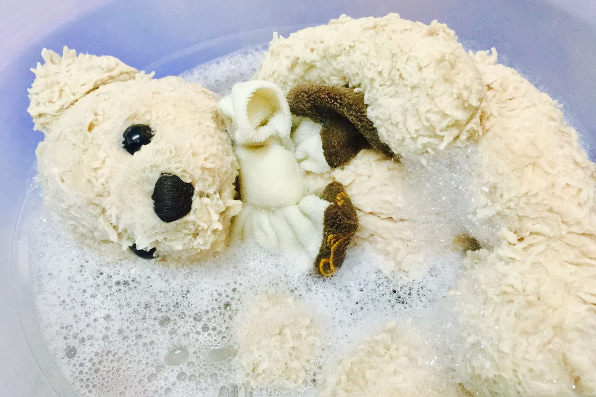 hand wash teddy bear stuffed animal in sink