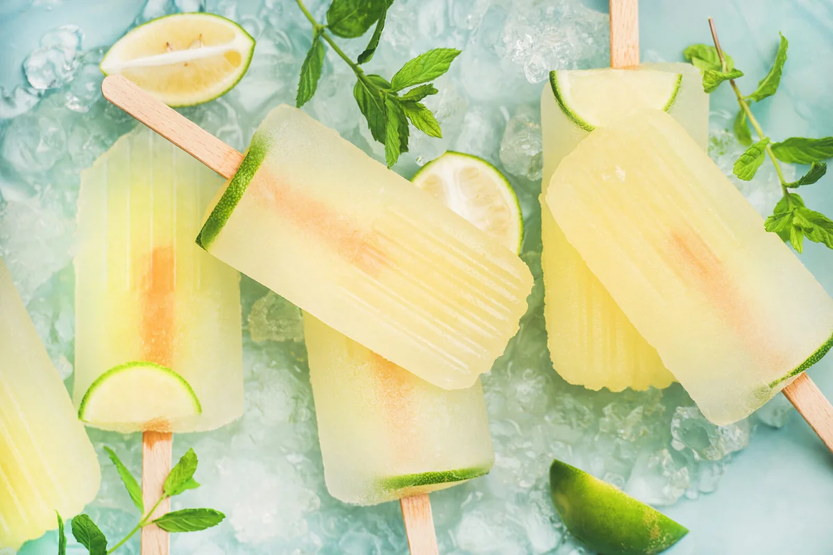 Summer lemonade popsicles with lime and chipped ice