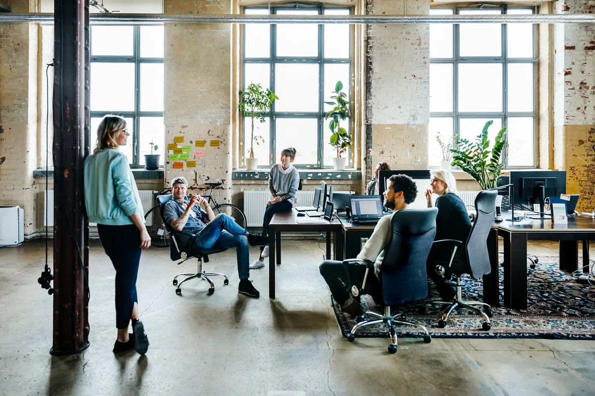 Group of casual business people and entrepreneurs having an informal meeting