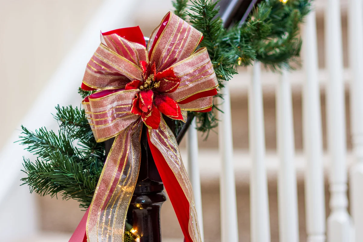 decorative Christmas bow on staircase