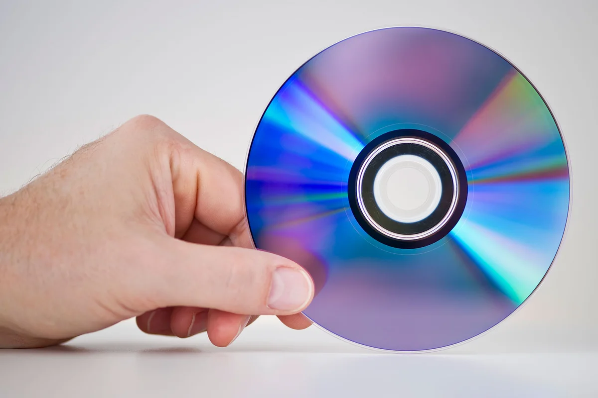 hand holding DVD disc