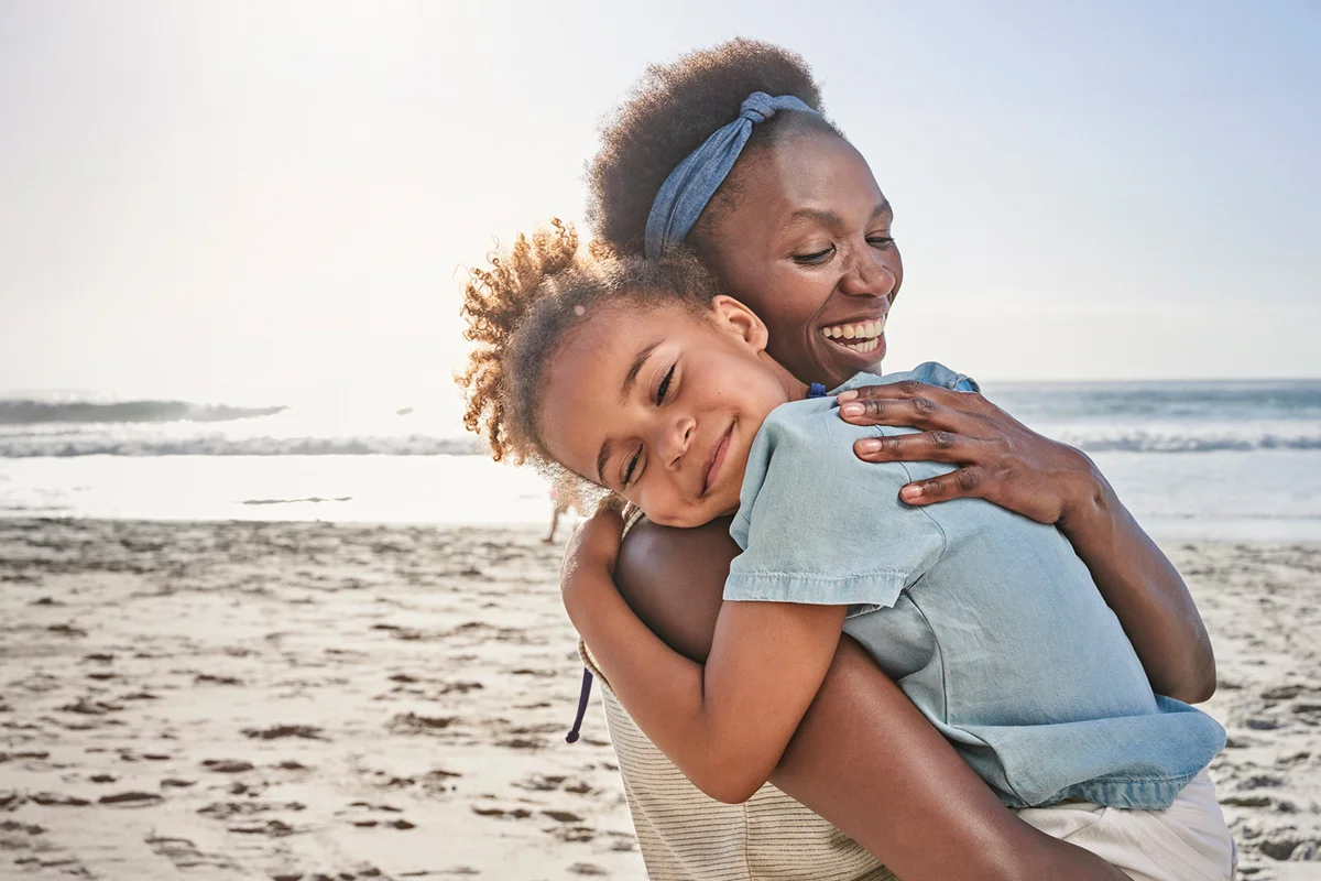 Mother and daughter on beach
