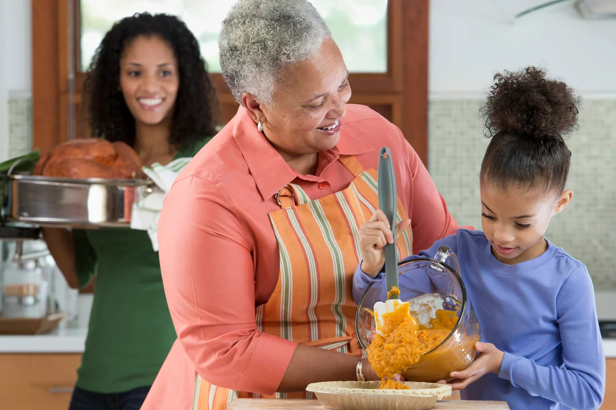 Three generations women cooking for Thanksgiving