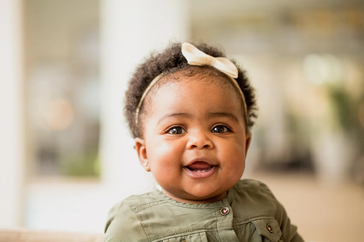 happy little girl laughing and smiling