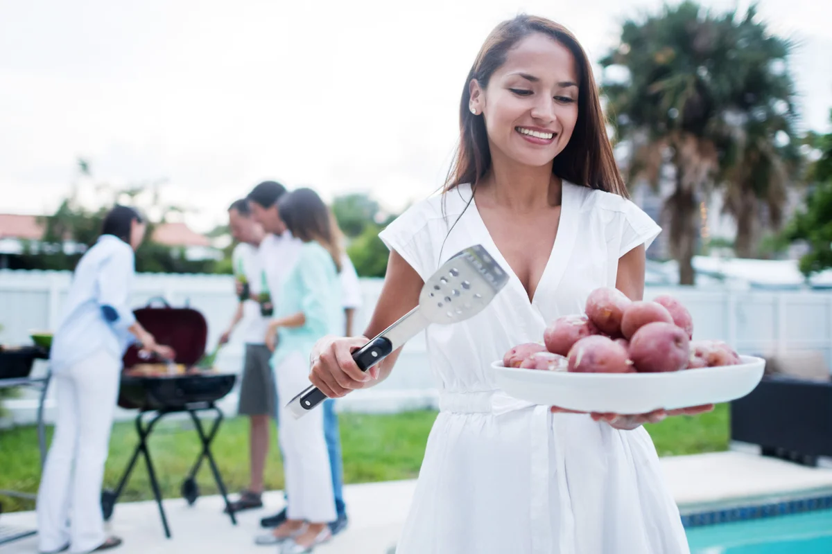 Happy woman at a BBQ