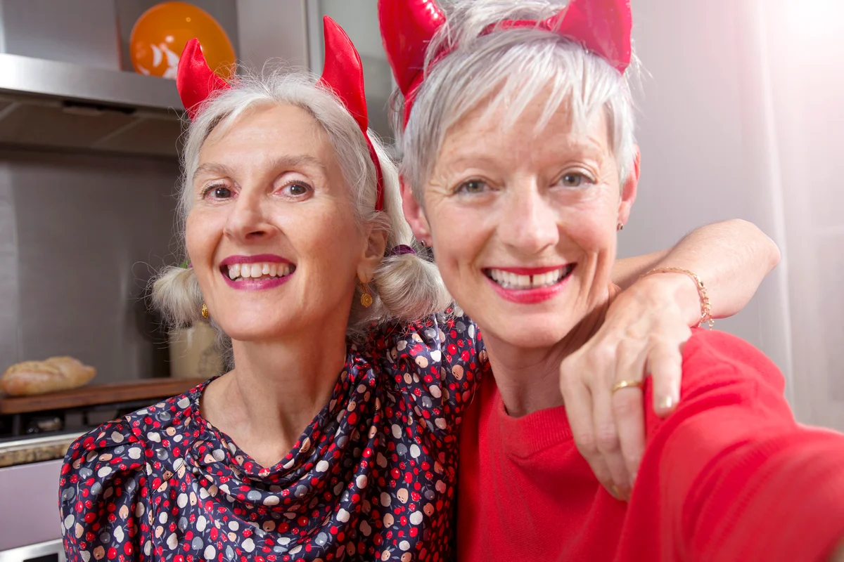 Women with devil horns