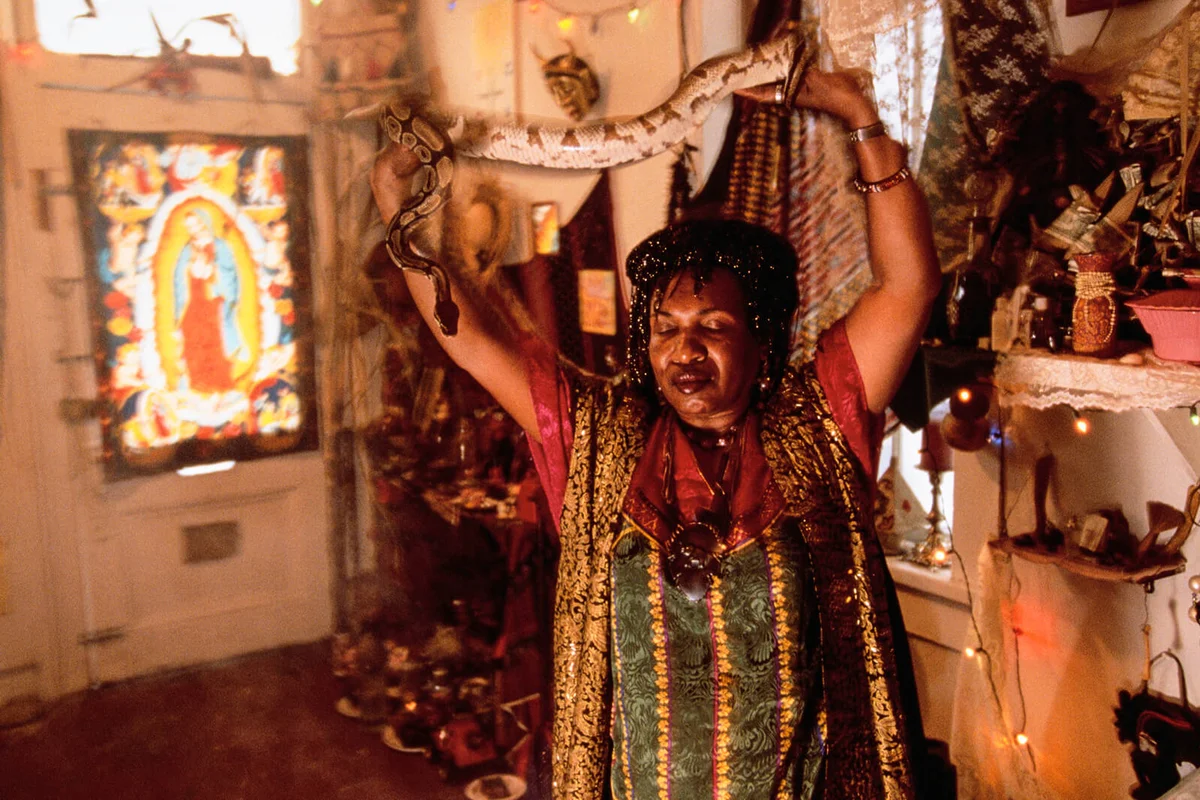 Voodoo Spiritual Woman Holding Snake