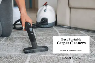 Woman cleaning carpet with a steam cleaner 