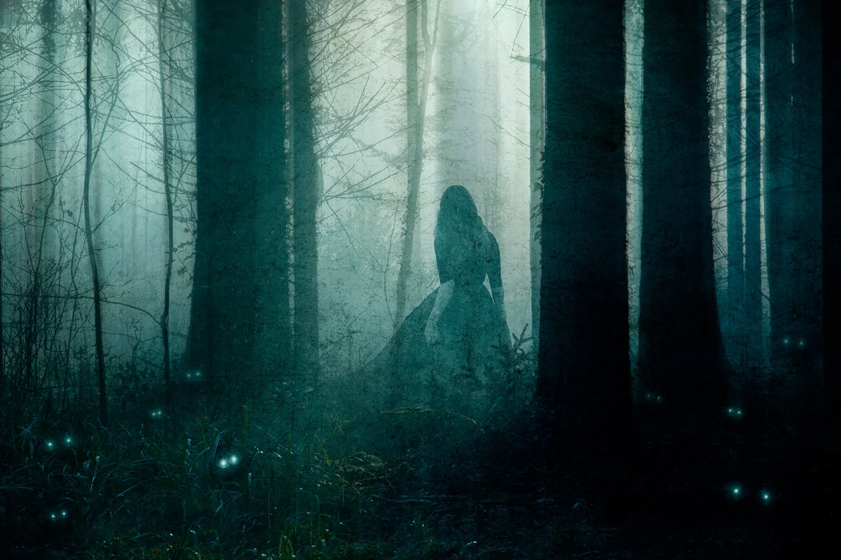 supernatural concept of a ghostly woman wearing a long dress