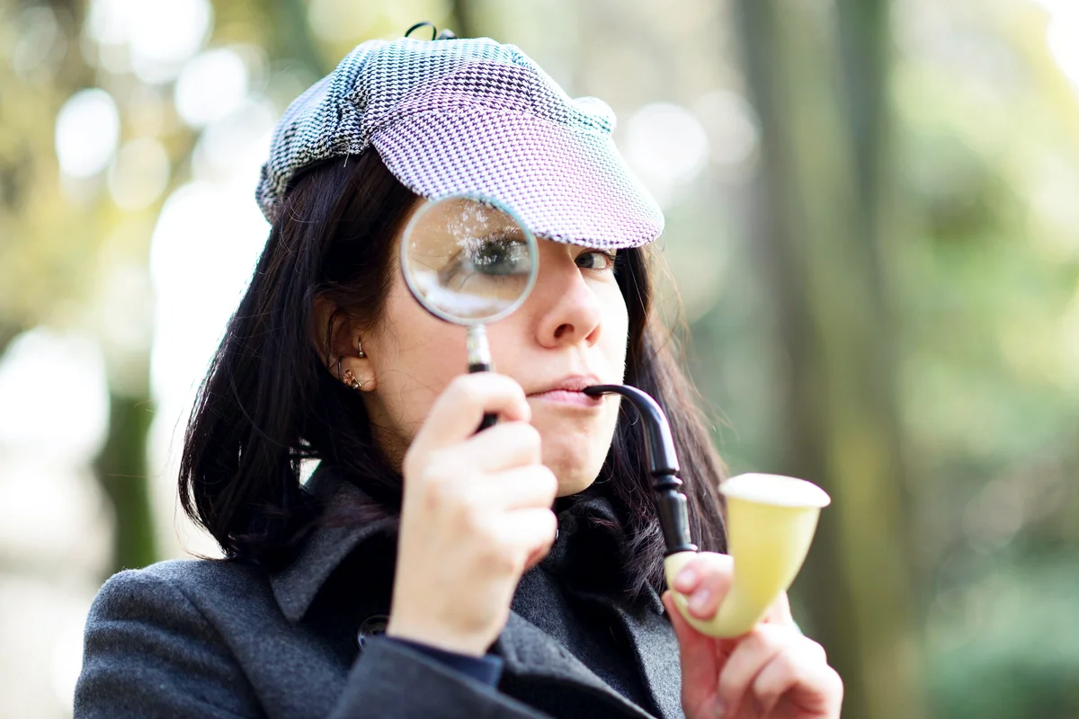 A woman dressed up as a detective