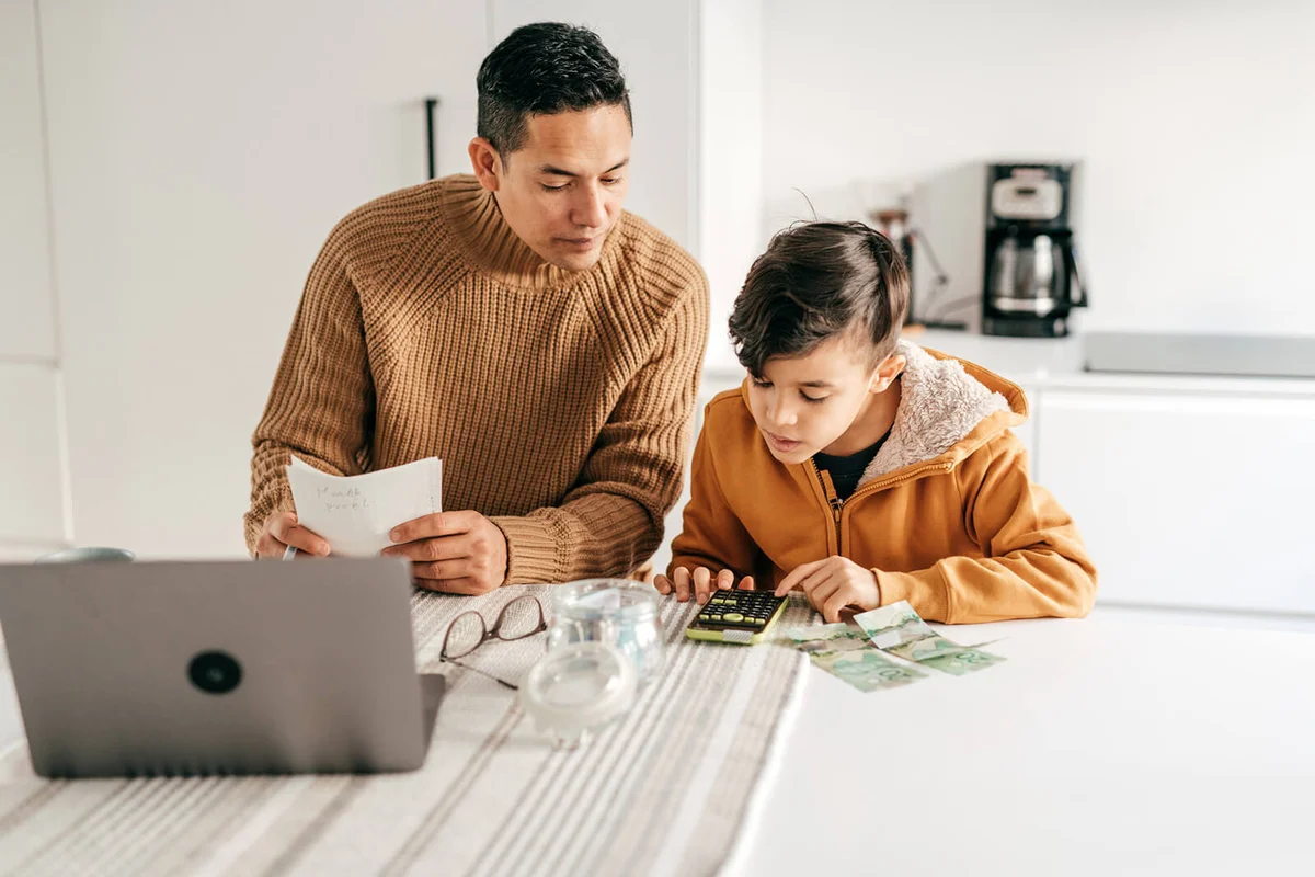 Dad and son deciding on financial details