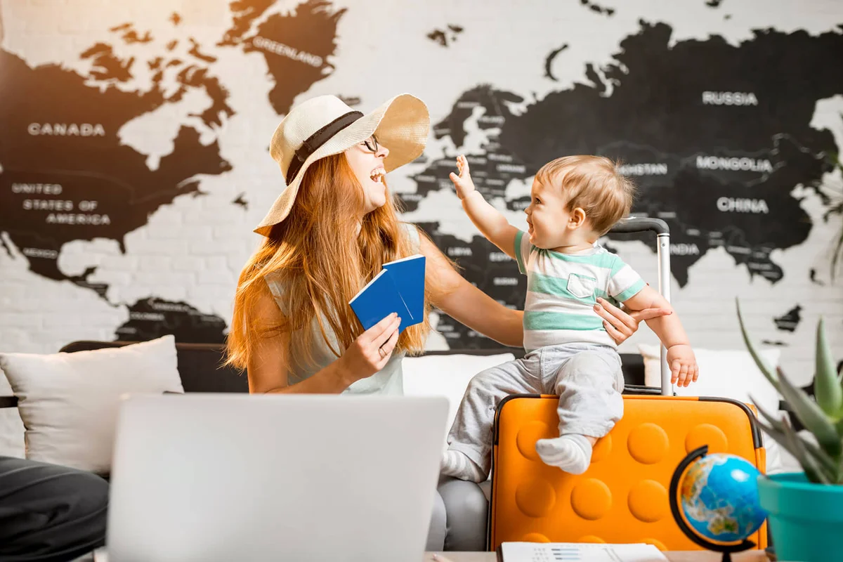 woman with baby boy sitting at the travel agency office