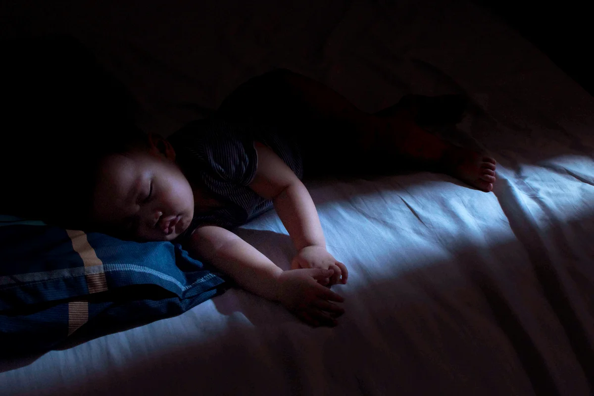 Baby boy is sleeping at night