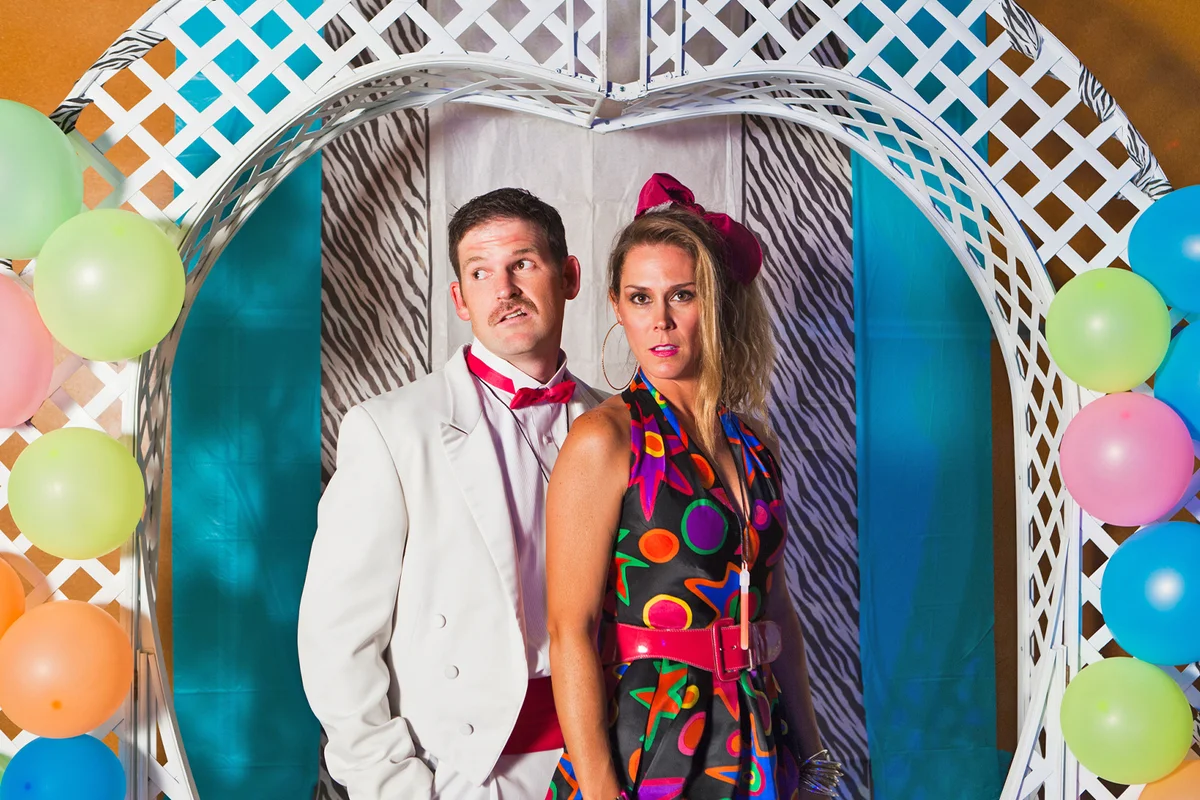 Caucasian couple at retro prom