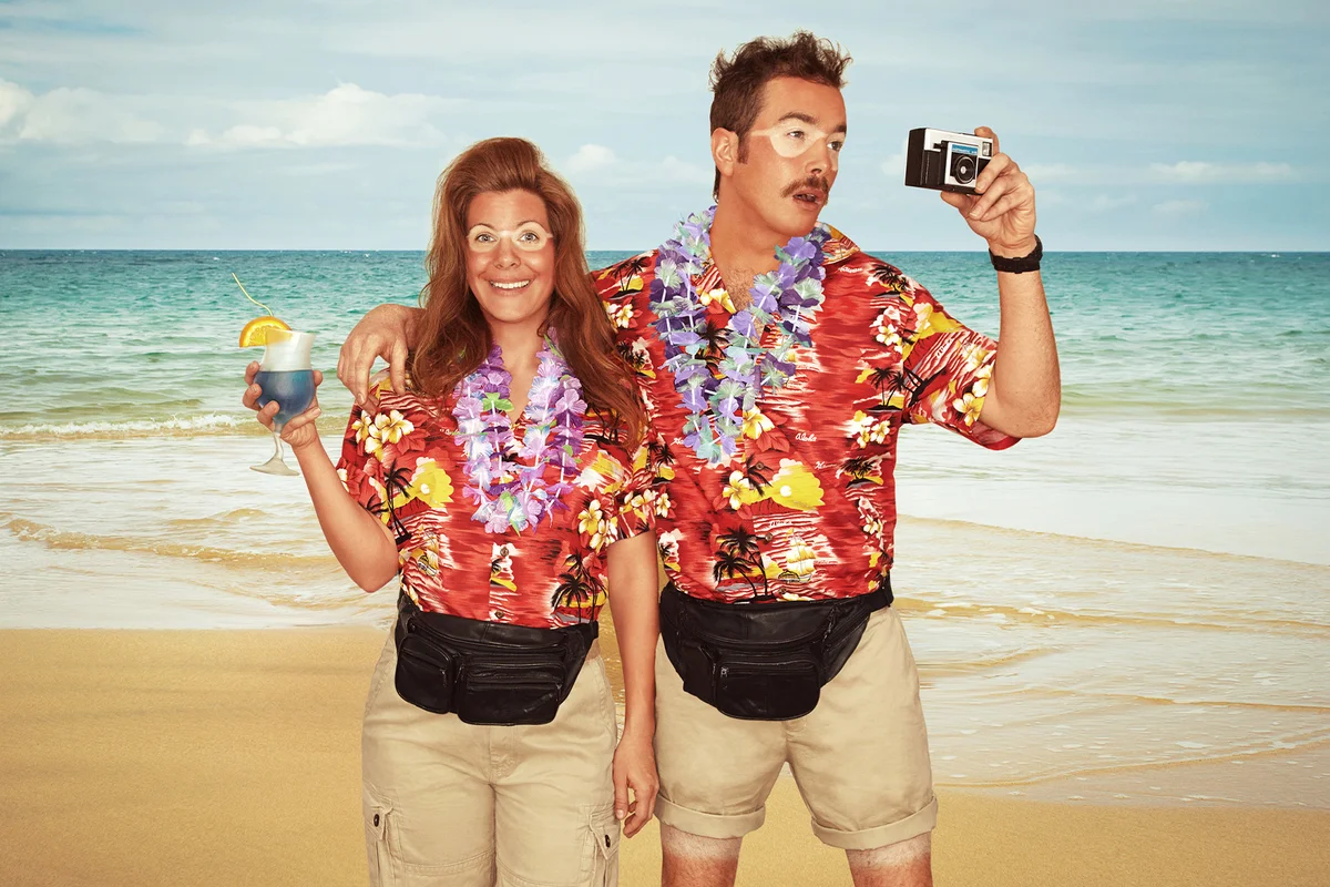 A sunburnt couple of tourists at the beach
