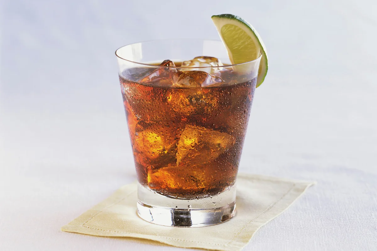 Rum and Cola with Lime Wedge