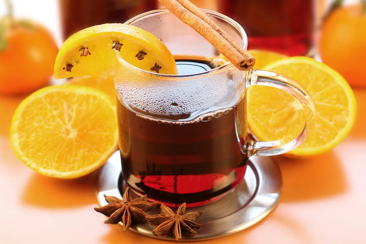 glass of Crisp Toddy  with orange, cinnamon, anise