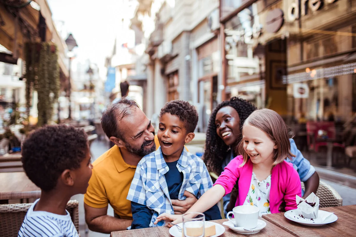 young family enjoying time together in a cafe