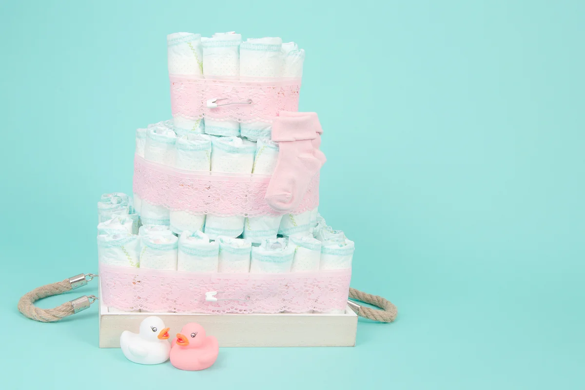 Diaper cake with rubber ducks and pink socks