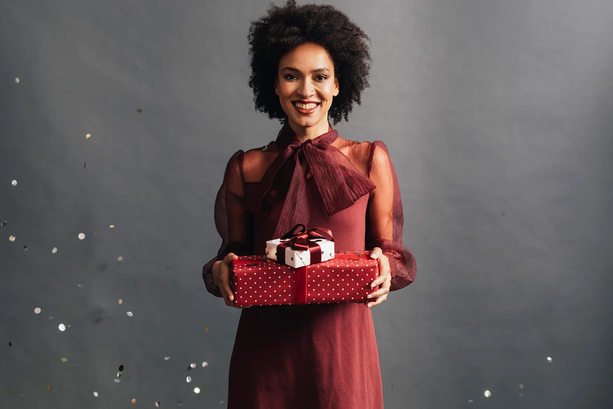 woman wearing burgundy dress for Christmas holiday