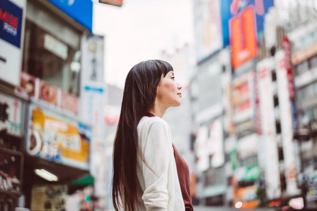 Pretty lady looking at the distance on Tokyo