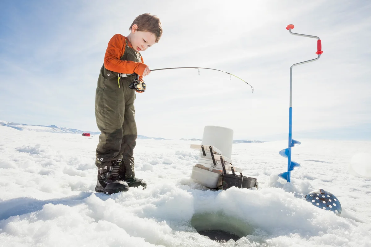 Boy ice fishing