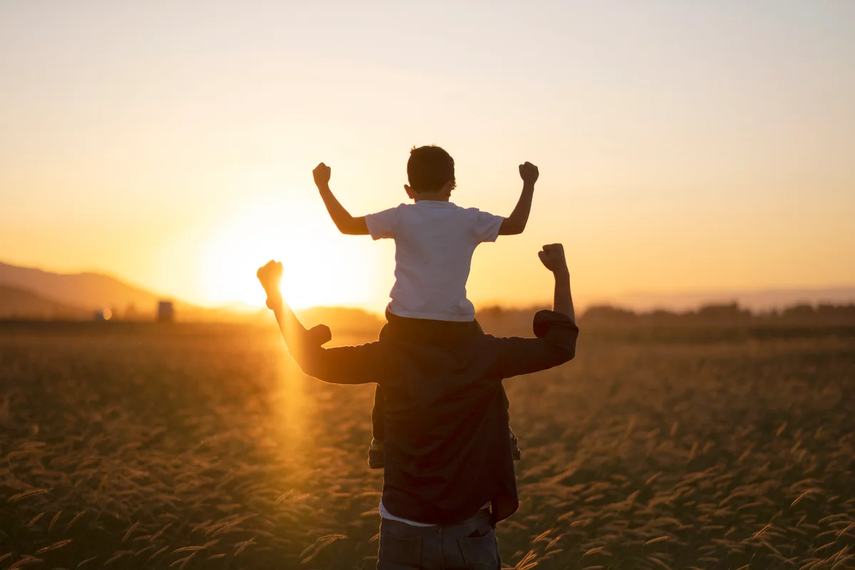 Dad and son outdoors